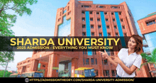 a woman points to a sharda university building