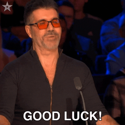 a man wearing glasses says 