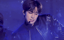 a close up of a person 's face with the word lullaby in the corner