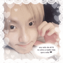 a picture of a boy with the words soy solo de eli & no amo a nadie más que a ella