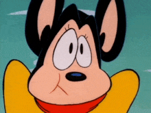a close up of a cartoon character 's face with a surprised look on his face