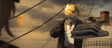 a man with a globe on his head is holding a clock in his hand