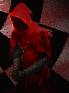 a person in a red hooded cloak is standing in front of a checkered floor