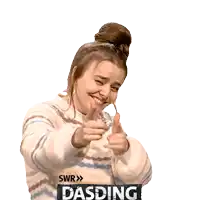 a woman in a striped sweater is pointing at the camera with the words swr dasding below her