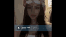 a blurred image of a woman with the words wondershare filmora on the bottom right