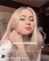 a girl with blonde hair says i love lesbians