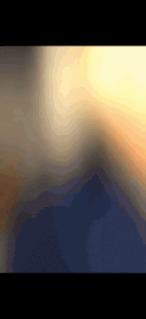 a computer generated image of a sunset with mountains in the distance
