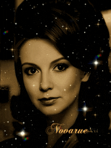 a woman 's face is surrounded by stars and the name novarue is on the bottom