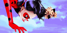 a ladybug and cat noir are upside down in the sky