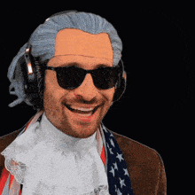 a man wearing a wig and headphones is smiling