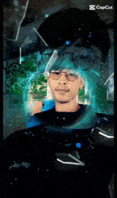 a picture of a man with glasses and a capcut logo in the upper right corner