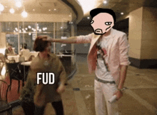 a man in a pink jacket is putting his hand on a woman 's head with fud written on the bottom right