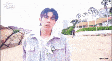 a man with a flower in his jacket is reaching out towards another man