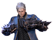 a man in a blue jacket is holding a pair of gloves with spikes on them