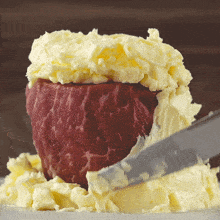 Putting Some Butter Guga Foods GIF - Putting Some Butter Guga Foods Covering It In Butter GIFs