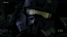 a close up of a helmet with edd written in green