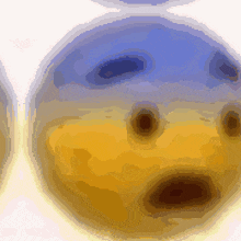 a close up of a blue and yellow smiley face
