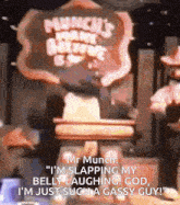 a cartoon character stands at a podium with a sign behind him that says mr munch