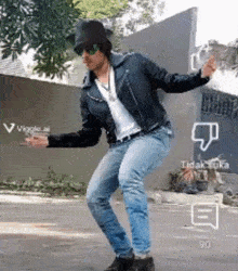 a man wearing a hat and sunglasses is riding a skateboard on the street .