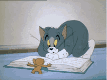 Tom And Jerry Cartoon GIF - Tom And Jerry Cartoon Book GIFs