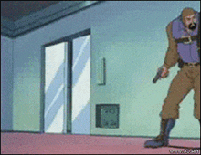 a man in a purple vest is holding a gun in a room with a sliding glass door
