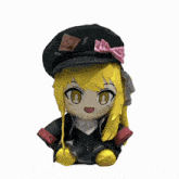 a stuffed doll with yellow hair wearing a black hat