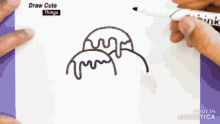 a person is drawing a jellyfish with a marker that says think on it
