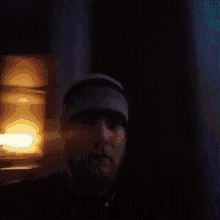 a blurry picture of a man in a hat
