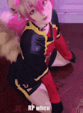a girl in a cosplay costume is kneeling down with the words rp when below her