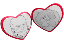 a couple of heart shaped mirrors with drawings on them