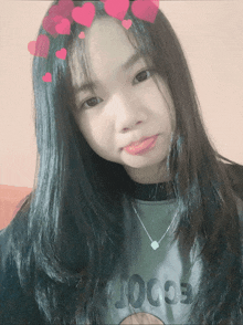 a young girl wearing a shirt that says ' joce ' on it