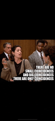 a group of people standing in a room with a caption that says there are no small coincidences