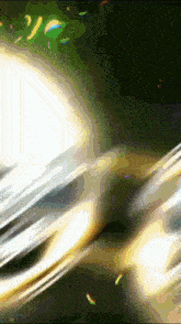 a close up of a ring with a rainbow colored background