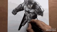 a drawing of batman is being made by animatica