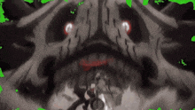 a close up of a monster 's face with red eyes and a green border .