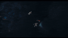 a man in a superman cape is flying in the air