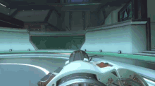 a video game is being played in a room with a steering wheel that says f4 on it .