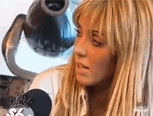 a close up of a woman 's face with the words rbd gif on the bottom right