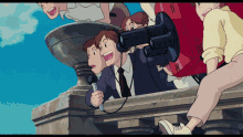 a man in a suit is holding a microphone and pointing at something