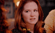 a woman with red hair says " oh uh "