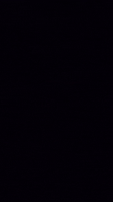 a group of cartoon characters are standing next to each other on a black background .
