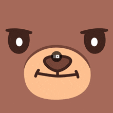 a teddy bear 's face is shown with a video playing in the corner