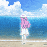a girl with pink hair and a white hat stands on a beach