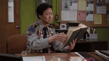 Pretending You'Re A Good Student In Front Of Ur Parents GIF - Community Ken Jeong Ben Chang GIFs
