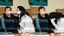 a man and a woman are sitting on a couch with their heads down