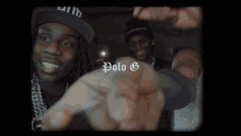 a man wearing a hat is pointing at the camera with the words polo g written on the bottom
