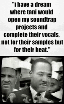 a black and white photo of martin luther king jr. speaking into a microphone