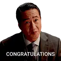 a man in a suit and tie with the words congratulations below him