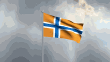 an orange flag with a blue cross on it