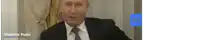 a man in a suit and tie with the name vladimir putin